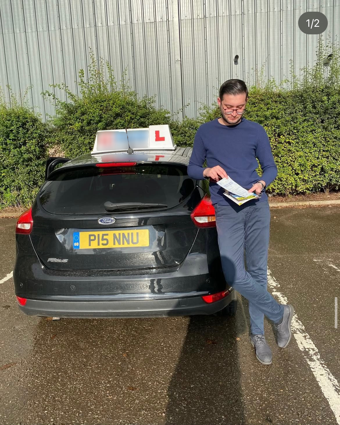 Driving school student holding certificate | passwithpannu